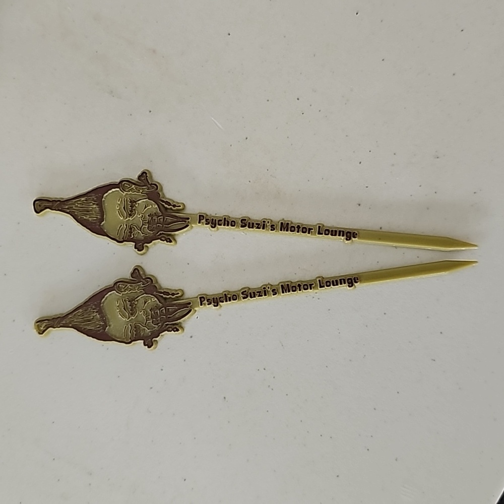 Psycho Suzi's Shrunken Head stir sticks